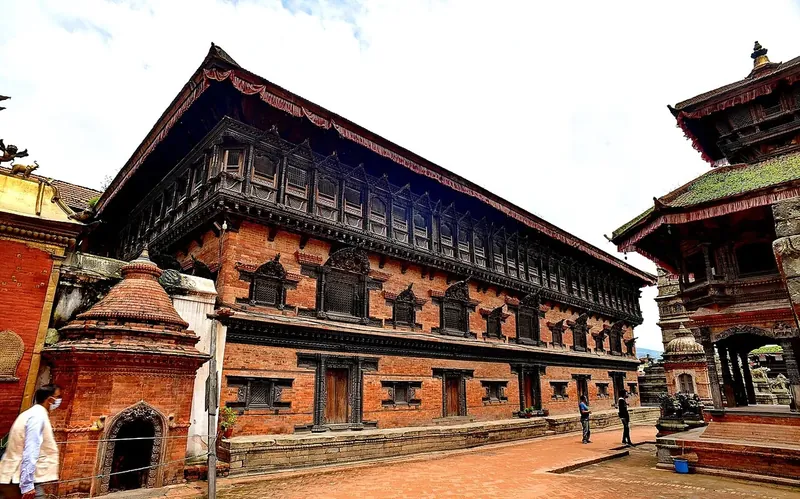 The long brick 55-Window Palace with its row of carved wooden windows