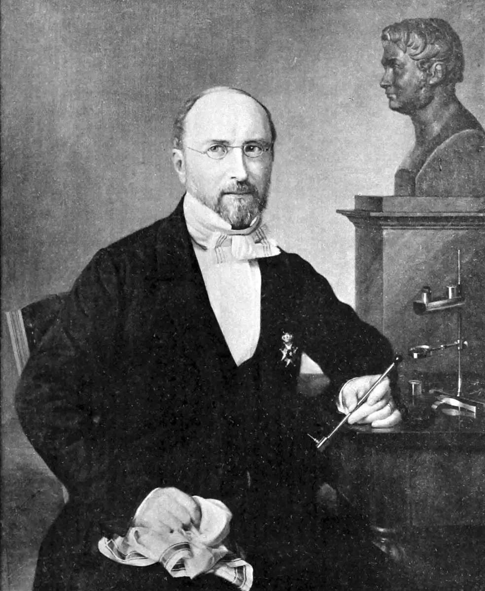 Black-and-white painting of a balding man with glasses and a short beard, in a dark coat, seated beside a table with laboratory stands and a bust