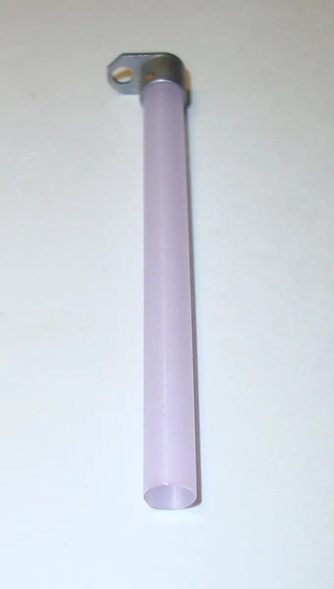 A pale pink glass-like rod about 6 cm long and as thick as a pencil, with a small metal mounting tab at one end