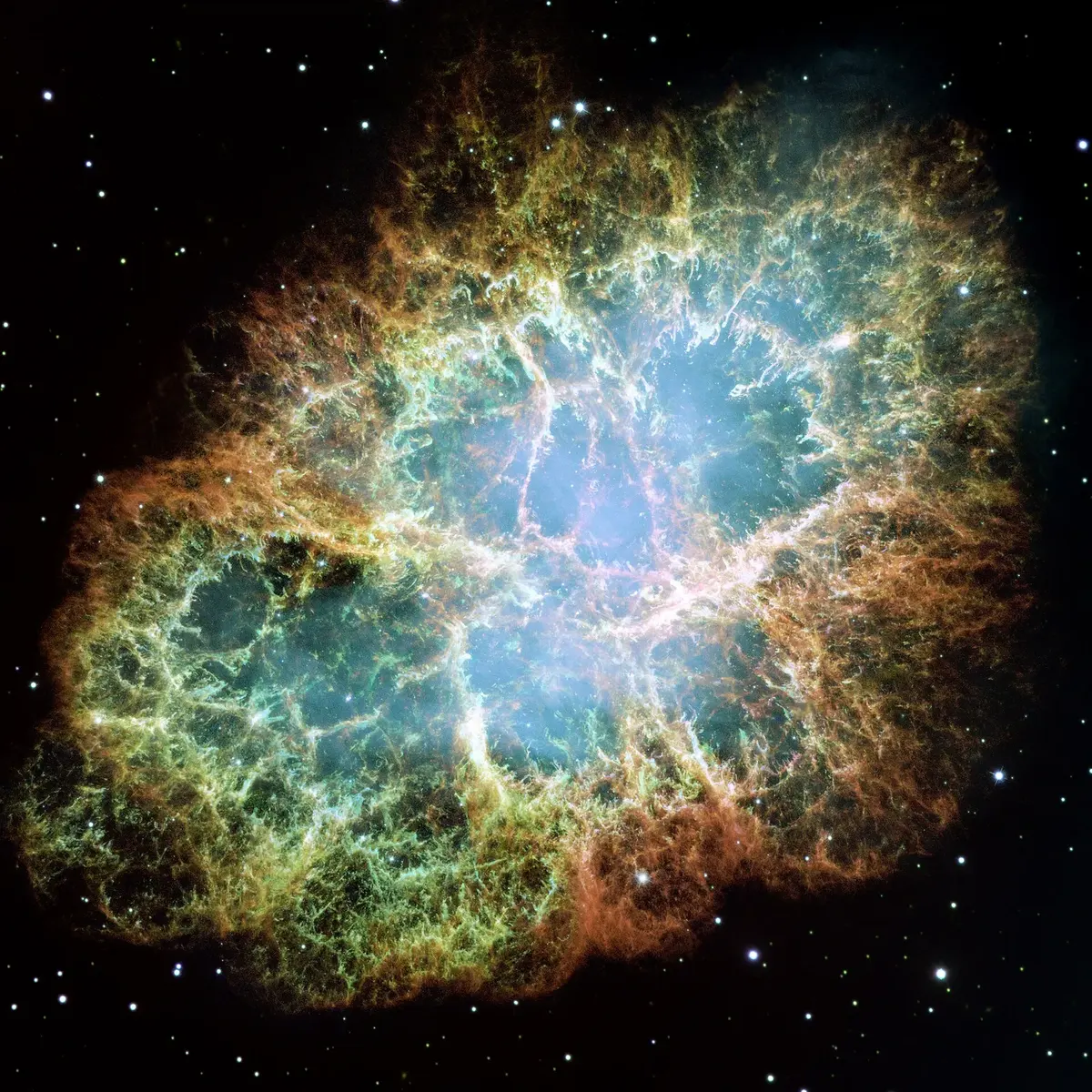 A glowing orange and blue cloud of tangled filaments, roughly oval