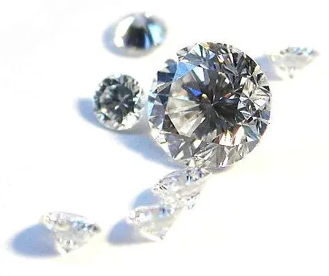 Several cut gemstones, clear and sparkling, with many flat faces