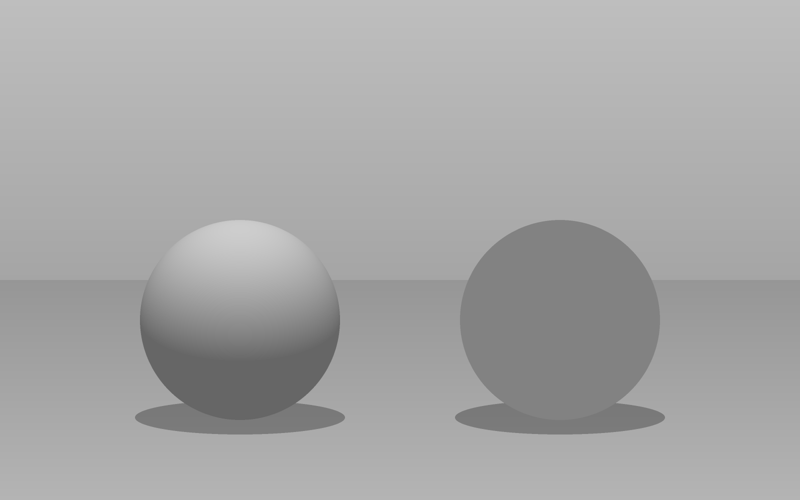 Two gray balls on the ground in light from above: the left one looks round, the right one like a flat disc