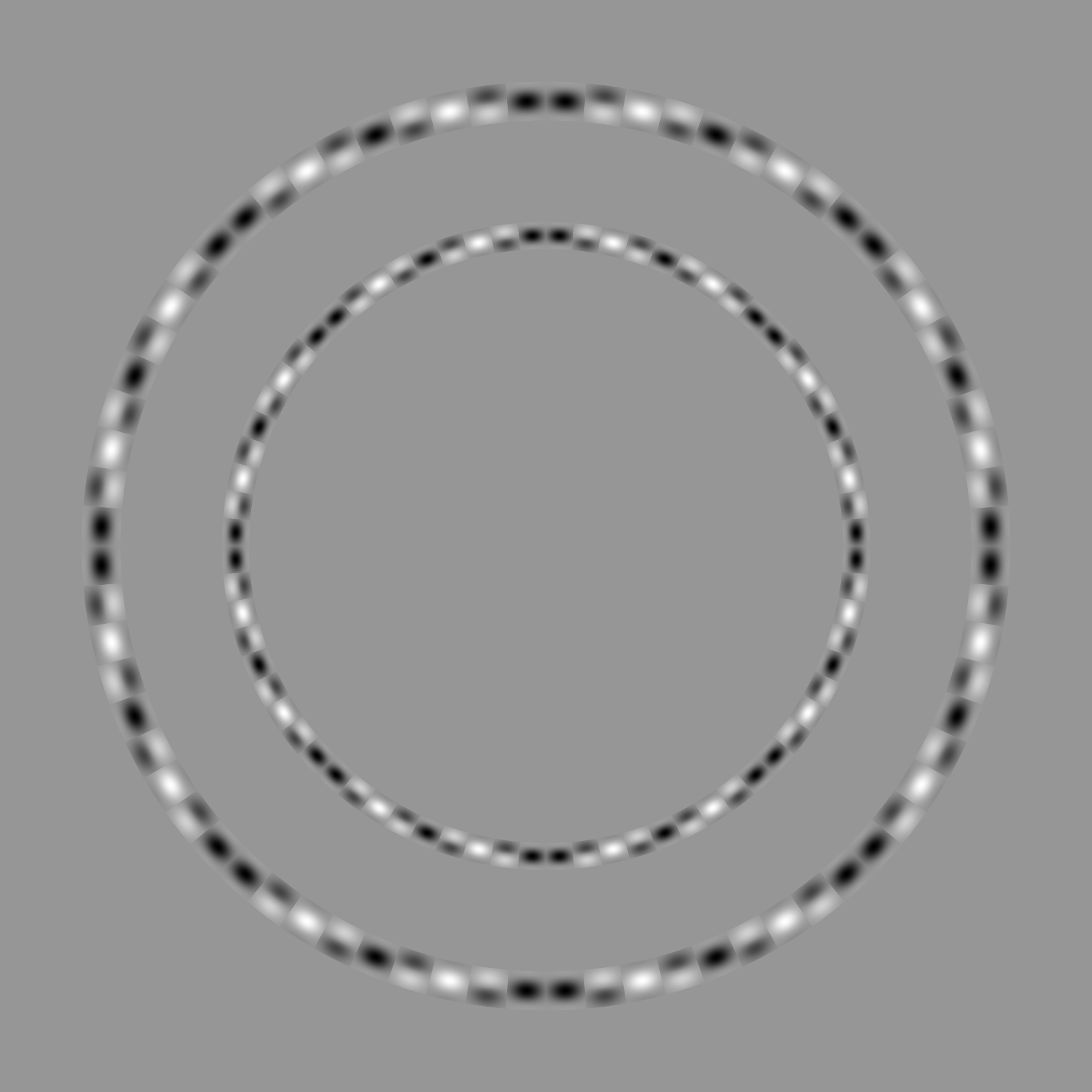 Two rings of soft black and white blobs on gray, one inside the other