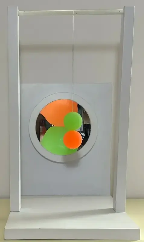 The Concave Mirror — A Swinging Reflection