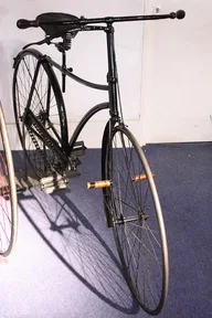 A safety bicycle from 1886, with a chain and two wheels of about the same size