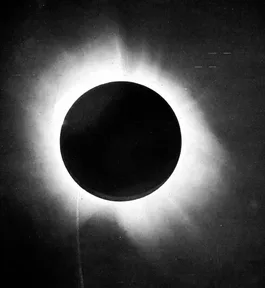 Eddington’s photograph of the 1919 total eclipse: the black Moon covering the Sun, ringed by the glowing corona