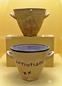 A rebuilt ancient Greek water clock: a clay pot that drains through a small hole near its base