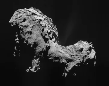 Comet 67P, a lumpy grey rock shaped like a rubber duck, photographed by Rosetta