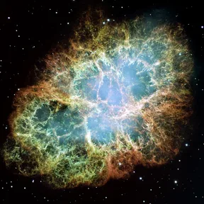 The Crab Nebula: a cloud of glowing orange and blue threads against black space