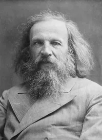 A photograph of Dmitri Mendeleev with long wild hair and beard