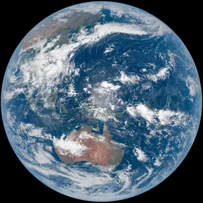 The whole round Earth seen from space, with clouds over blue oceans and land