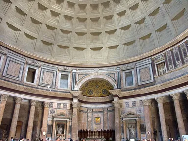 Inside the Pantheon in Rome: a huge concrete dome with a round opening at the top
