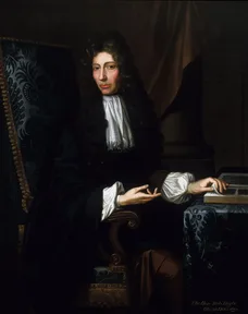 A painted portrait of Robert Boyle in a long wig, with his air pump beside him